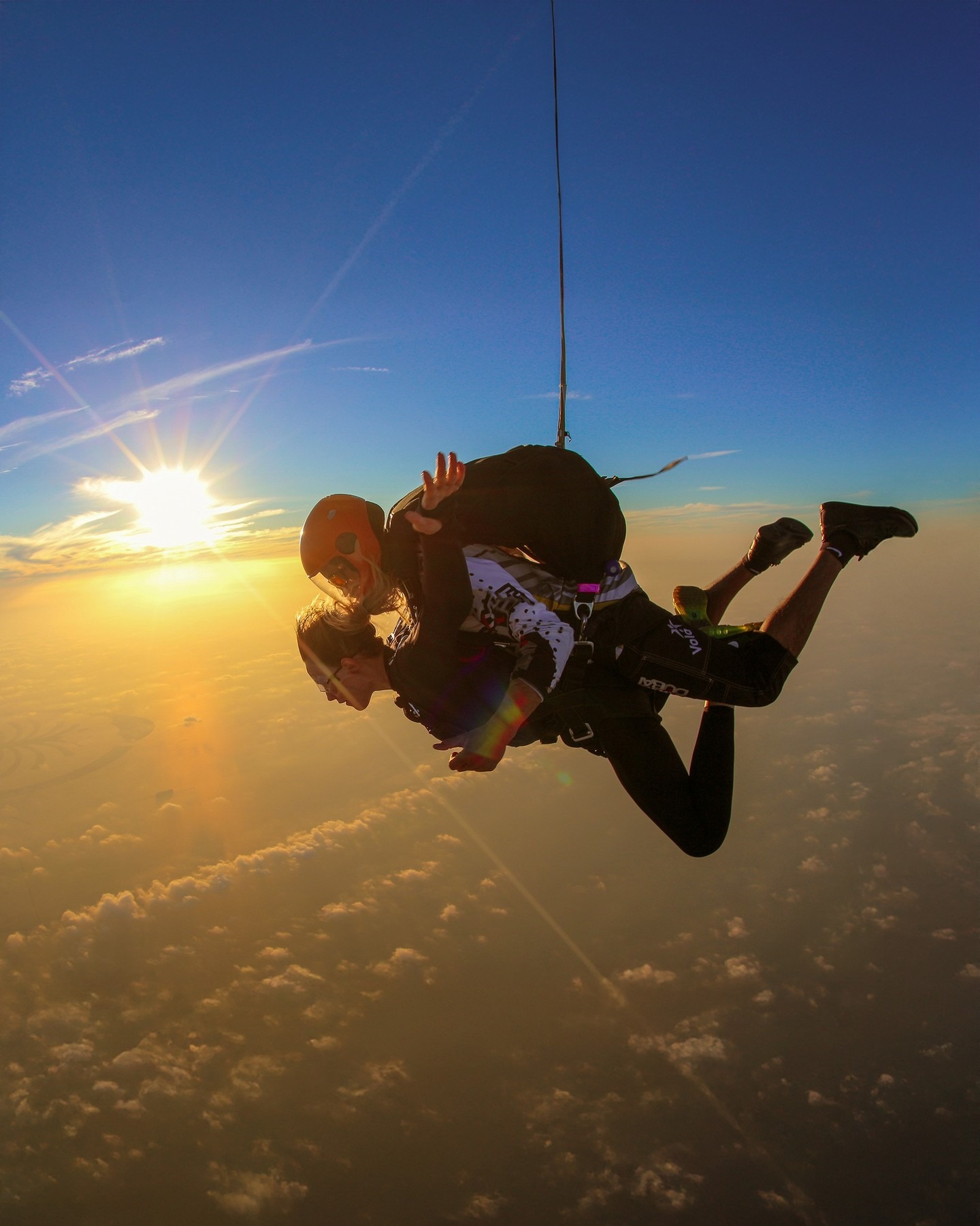 sunset skydiving Dubai golden hour freefall