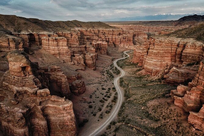 Winding dirt road through Charyn Canyon in Kazakhstan