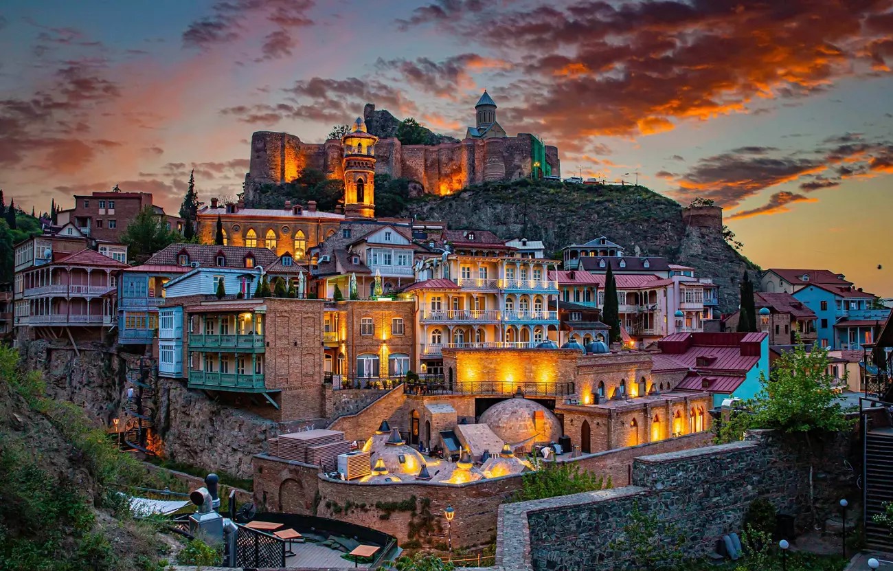 Tbilisi old town with Narikala Fortress at sunset