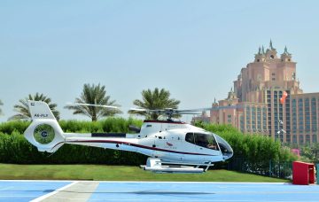 Luxury helicopter parked on helipad at Atlantis The Palm Dubai