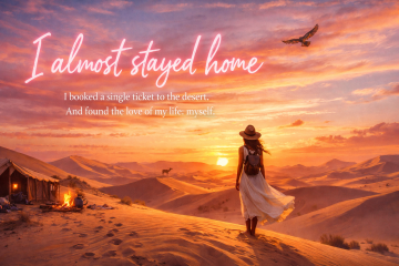 Solo woman traveler standing on desert dunes at sunset, beginning a self-discovery journey in the UAE