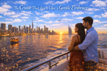 Couple embracing on a luxury yacht cruise in Dubai Marina during sunset with city skyline and Burj Al Arab view