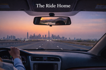 The open road back to Dubai, with mountains fading behind and the city skyline waiting ahead.