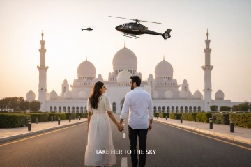 Couple holding hands walking toward Sheikh Zayed Grand Mosque with helicopters flying overhead