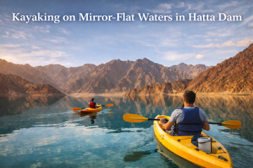 Gliding across the still waters of Hatta Dam.