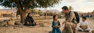Young girl weaving palm basket while grandmother watches at traditional desert farm