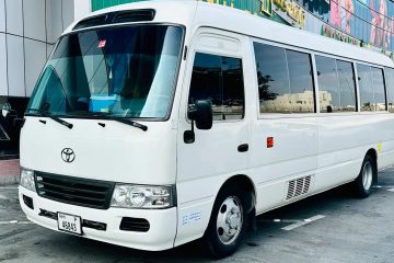 Toyota HiAce minibus parked in UAE for group transfer and chauffeur service