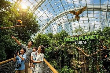 exterior view of The Green Planet Dubai glass biodome building City Walk