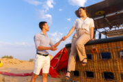 Couple enjoying a hot air balloon adventure in Dubai's desert