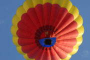 Hot air balloon being inflated in the Dubai desert at dawn.