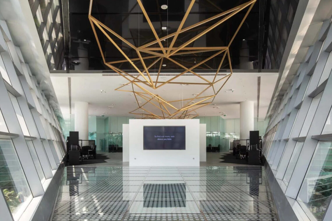 Dubai Diamond Exchange interior with geometric ceiling structure and glass walls