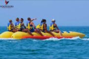 A group enjoying an exciting Banana Ride on the waves.