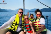 Family enjoying a boat cruise on calm waters