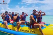 Adventurous group posing on the Banana Bus in Fujairah.