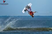 Wakeboarder performing a backflip on Fujairah waters