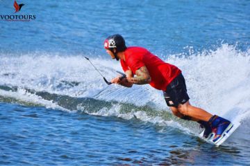 Extreme wakeboarding trick over water