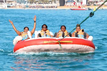 Hold on tight and feel the thrill of the waves! Perfect for a group adventure at sea