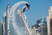 Man performing a flyboarding maneuver