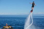 Flyboarding acrobatics over Dubai Marina