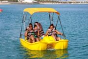 Group Enjoying a Pedalo Boat Ride in Dubai