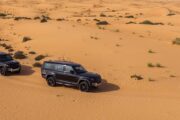 Luxurious Land Rover Defender in Dubai Desert