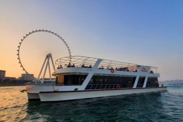 Sunset yacht cruise with Ain Dubai in the background