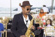 Musician playing a saxophone on a luxury dinner cruise in Dubai