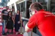 Photographer taking a family picture on a yacht in Dubai