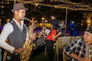 Saxophonist entertaining guests on a yacht in Dubai Marina