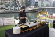 Chef preparing food on a luxury yacht