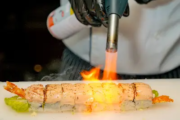 Chef Preparing Torched Sushi Onboard