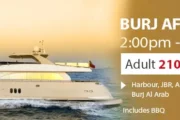 Luxury yacht at sunset for Burj Afternoon Tour in Dubai.