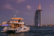 Yacht under a beautiful sunset near the Burj Al Arab in Dubai