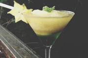 Refreshing cocktail with a starfruit garnish