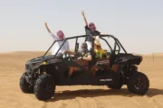 4x4 vehicle performing dune bashing in Dubai desert