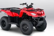 Red Suzuki King Quad 4x4 ATV on a white background.