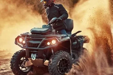 Group of riders enjoying a quad biking adventure in the desert