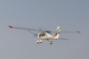 Light sport aircraft A6 MEC taking off from the runway.