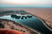 An aerial view of Dubai’s Love Lake, surrounded by the desert.