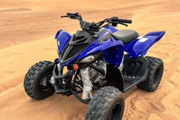 Blue Yamaha Raptor 700cc on the Sand