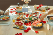 Romantic breakfast setup with rose petals