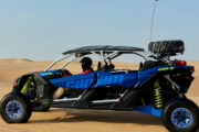 A fleet of Can-Am Maverick X3 dune buggies ready for adventure.