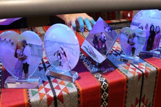 Personalized photo crystals displayed on traditional Arabic fabric