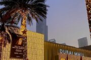 Dubai Mall with Burj Khalifa in background during twilight