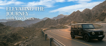 VooTours luxury vehicle on mountain road Fujairah chauffeur service