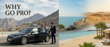 private chauffeur luxury car coastal road desert landscape UAE travel experience