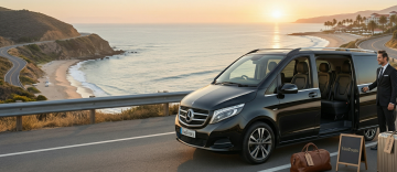 luxury chauffeur van UAE coastal road sunset private transfer premium travel experience