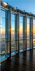 panoramic city view from observation deck in Dubai at sunset