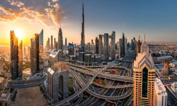 Dubai skyline Burj Khalifa Sheikh Zayed Road interchange downtown skyscrapers aerial view