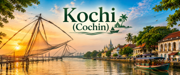 Chinese fishing nets and the historic waterfront of Kochi (Cochin), Kerala at sunset.